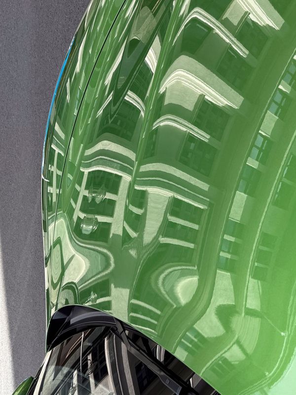 green Porsche - Berlin Friedrichstrasse