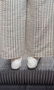 woman on an escalator