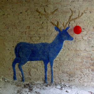 Deer with a red balloon
